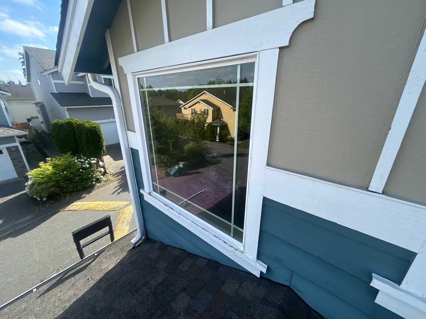Window and trim work on a Pacific Northwest two-story home